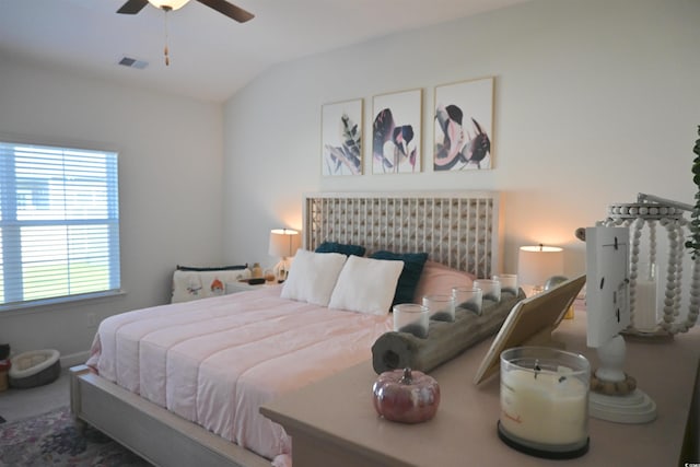 bedroom featuring lofted ceiling and ceiling fan