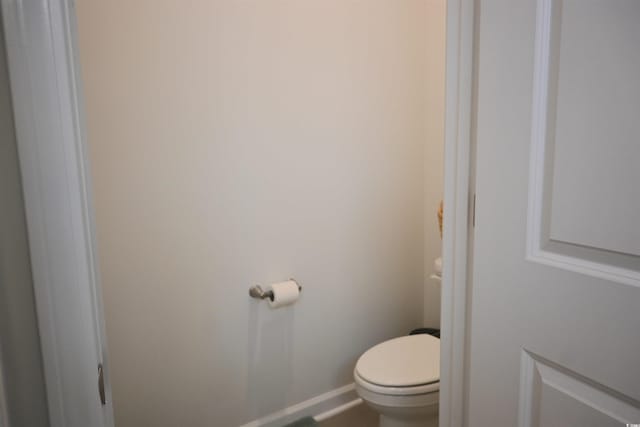 bathroom featuring toilet