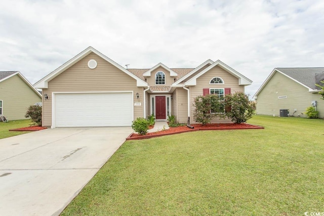 view of front of property with a garage, central AC unit, and a front lawn