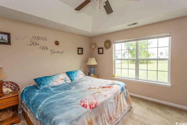 bedroom featuring ceiling fan and light colored carpet