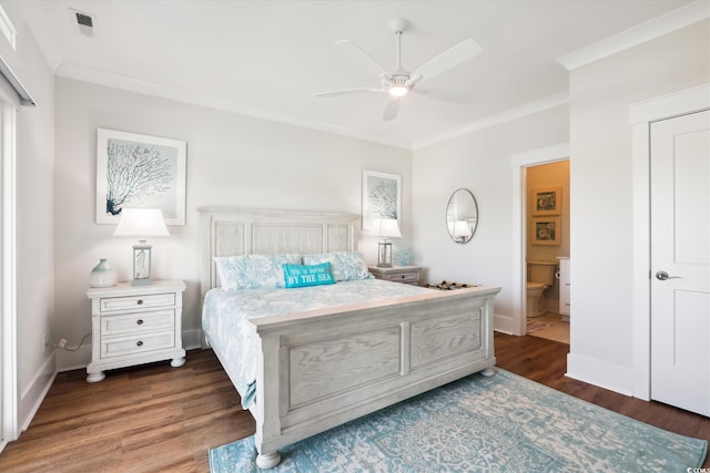 bedroom featuring visible vents, a ceiling fan, dark wood finished floors, crown molding, and baseboards