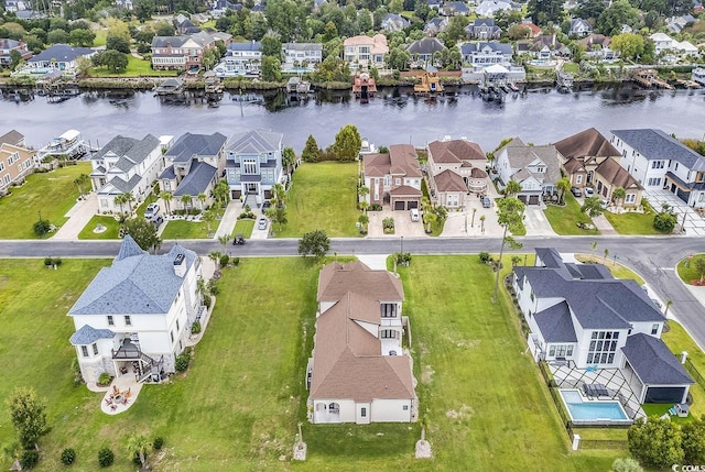aerial view featuring a water view and a residential view