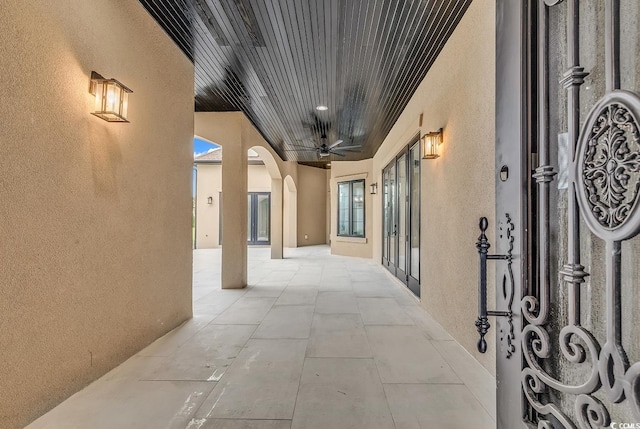 exterior space with arched walkways