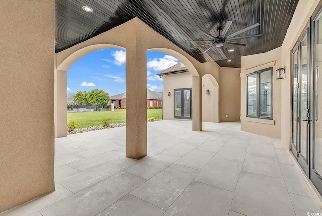 view of patio / terrace featuring ceiling fan