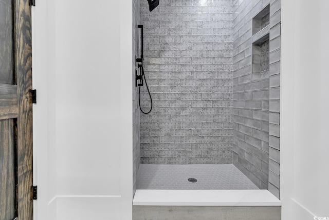 bathroom with a stall shower