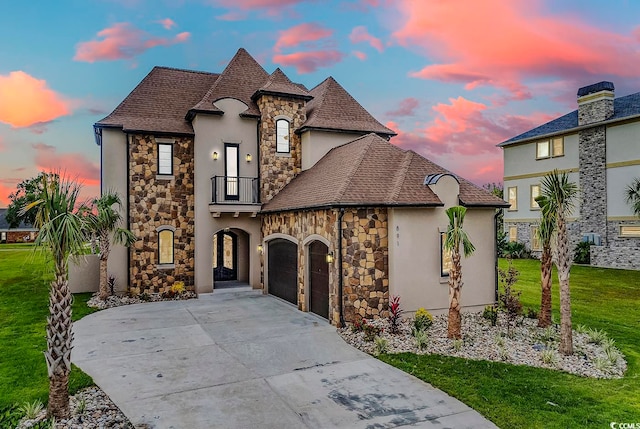 french country inspired facade with a yard