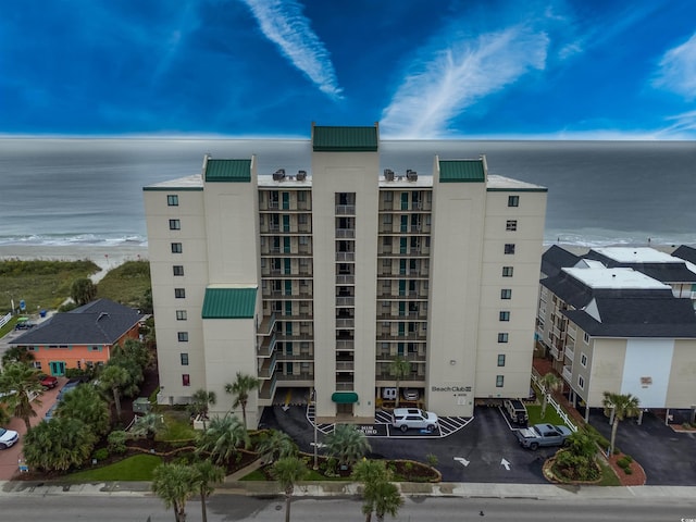 view of building exterior with a water view