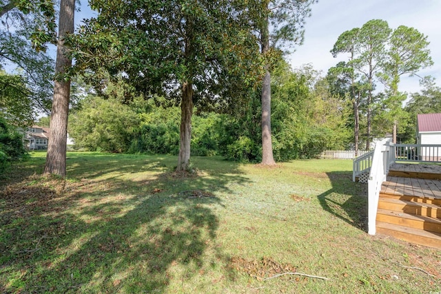 view of yard with a deck