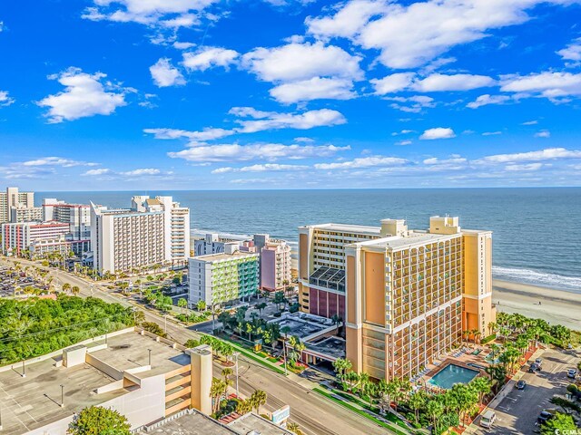 aerial view with a beach view and a water view