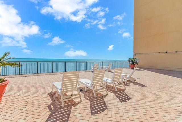 6900 N Ocean Blvd Unit 1040, Myrtle Beach, SC 29572 - view of patio / terrace with outdoor dining space and a water view