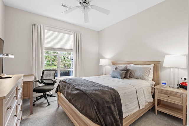 carpeted bedroom featuring ceiling fan