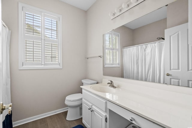 bathroom with vanity, toilet, a shower with shower curtain, and hardwood / wood-style flooring