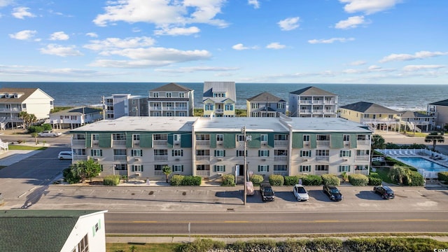 view of building exterior featuring a water view