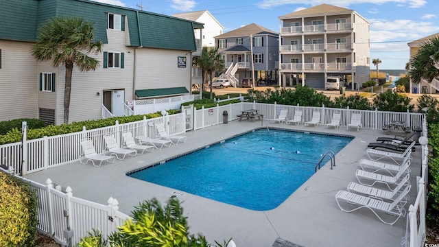 view of pool with a patio