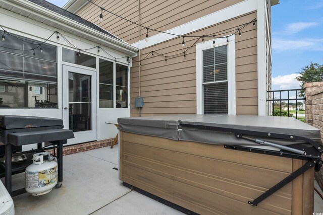 view of patio featuring a hot tub