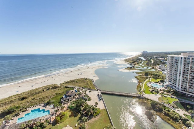 bird's eye view with a water view and a view of the beach