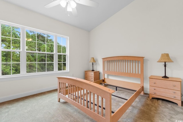 bedroom with carpet, vaulted ceiling, and ceiling fan