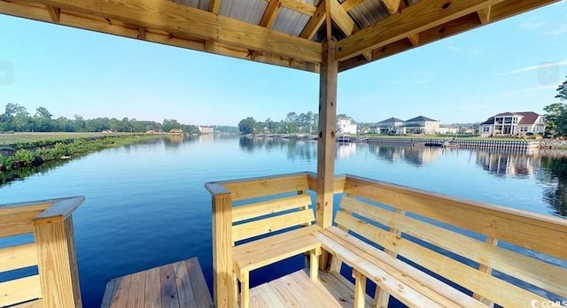 view of dock with a water view