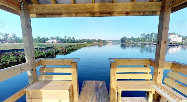 dock area featuring a water view