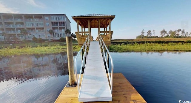 dock area featuring a water view