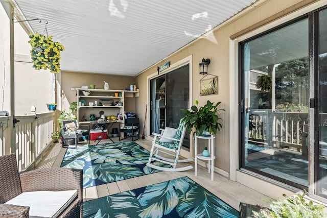 view of patio / terrace with a balcony