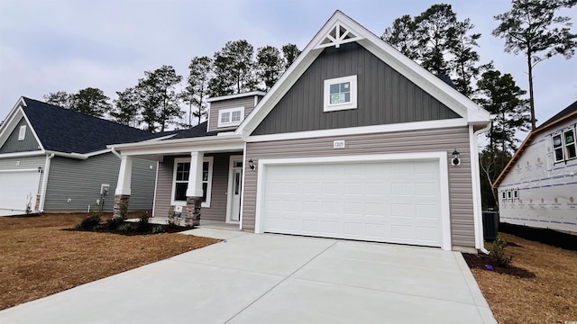 craftsman house featuring a garage and covered porch