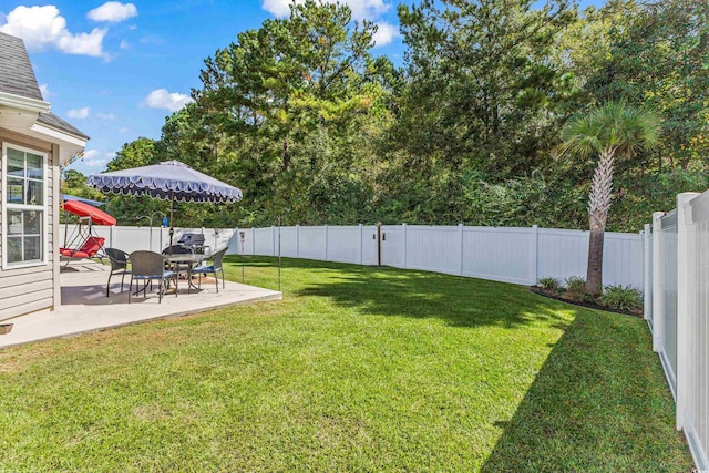 view of yard with a patio area