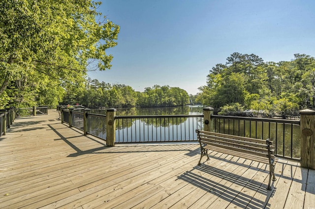 deck featuring a water view