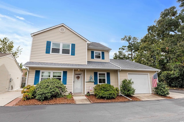 view of front of home with a garage