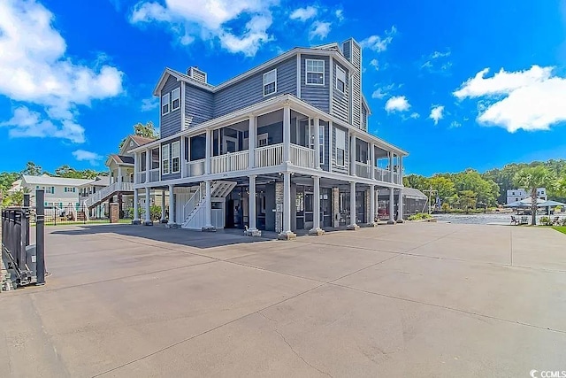 3815 Ed Smith Ave, Myrtle Beach, SC 29588 - view of building exterior with stairway