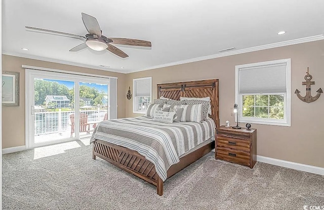 3815 Ed Smith Ave, Myrtle Beach, SC 29588 - carpeted bedroom featuring multiple windows, crown molding, access to outside, and baseboards