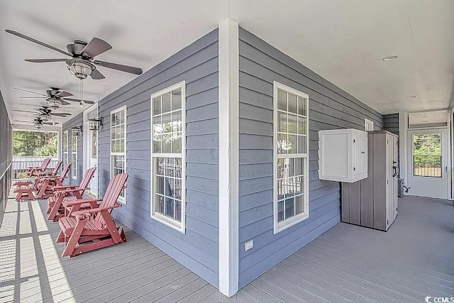 exterior space featuring ceiling fan and covered porch