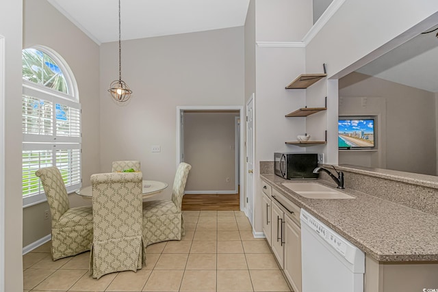 kitchen with dishwasher, decorative light fixtures, plenty of natural light, and sink