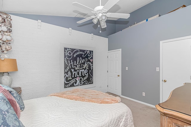 carpeted bedroom featuring ceiling fan and vaulted ceiling