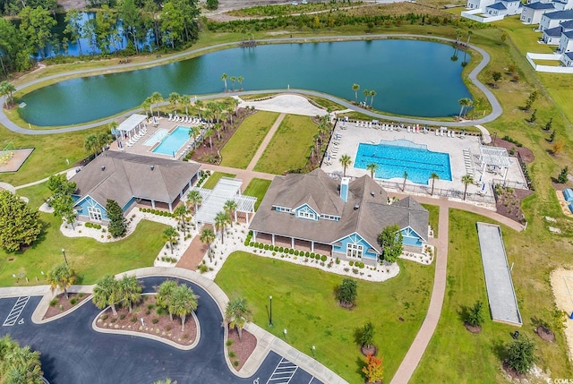 drone / aerial view with a water view