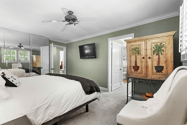 bedroom with ceiling fan, ornamental molding, and light carpet