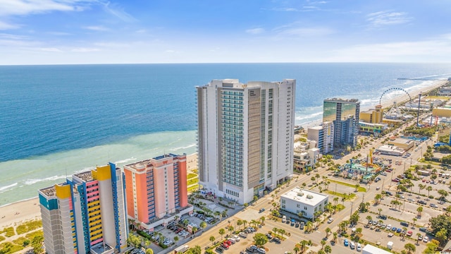 drone / aerial view with a view of the beach and a water view