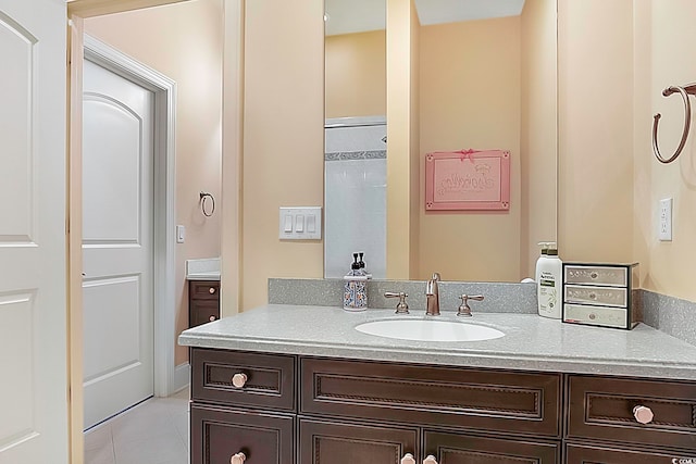 bathroom featuring vanity and tile patterned floors