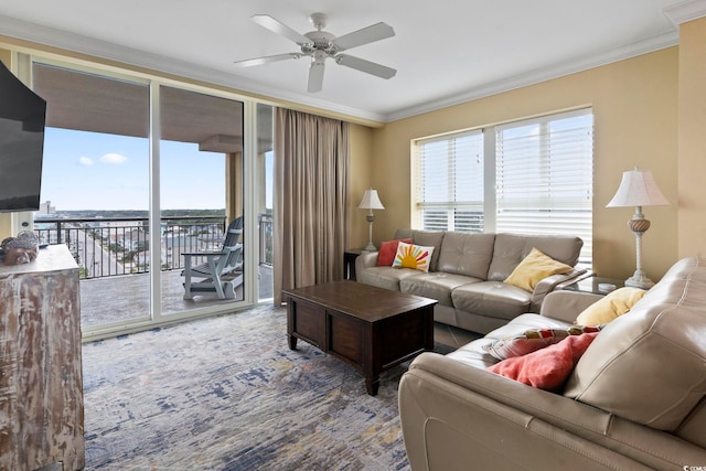 living room featuring crown molding and ceiling fan