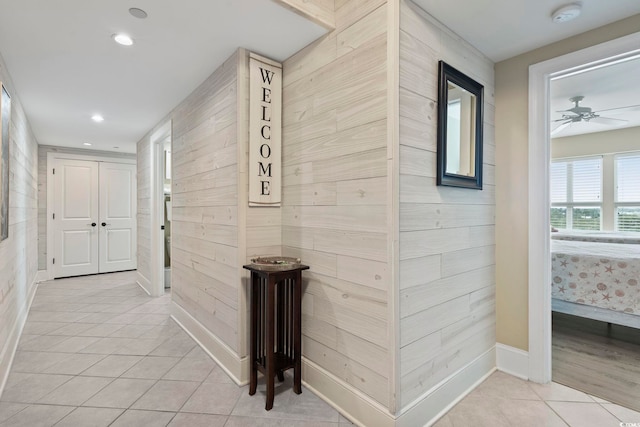 hallway with light tile patterned floors