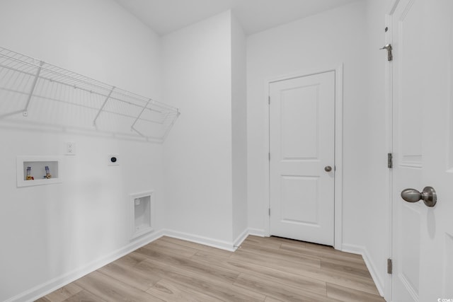 laundry room featuring hookup for an electric dryer, light wood-type flooring, and washer hookup