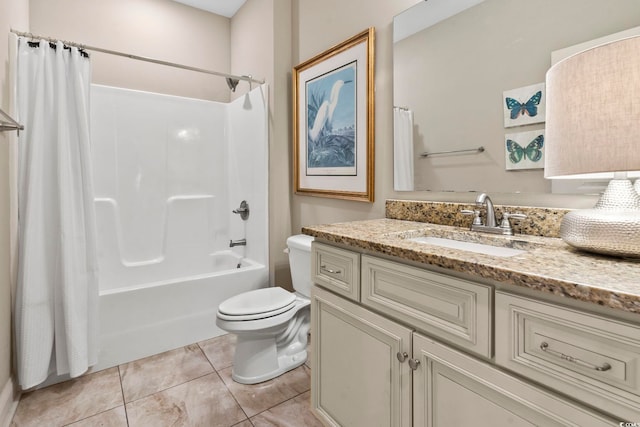 full bathroom with vanity, shower / tub combo, tile patterned floors, and toilet