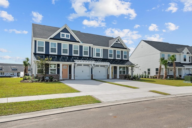 view of front of home with a garage and a front lawn