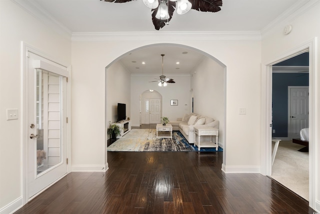 interior space with crown molding and dark hardwood / wood-style floors