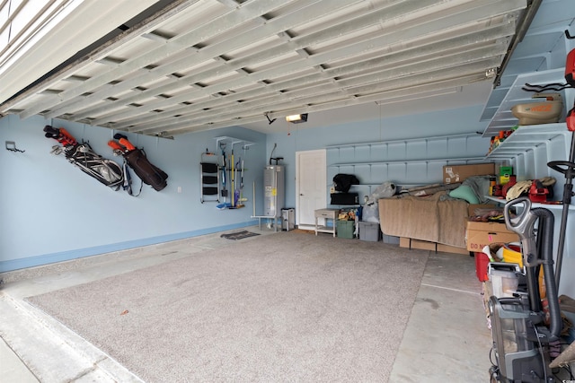 garage with water heater and a garage door opener