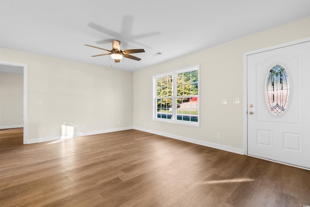 foyer entrance featuring hardwood / wood-style floors and ceiling fan