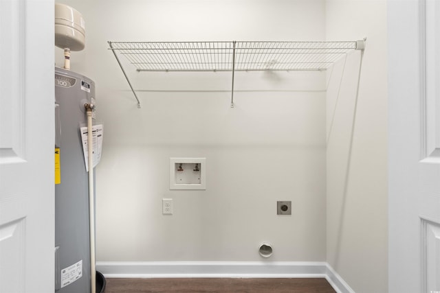 laundry room featuring water heater, dark hardwood / wood-style floors, washer hookup, and electric dryer hookup