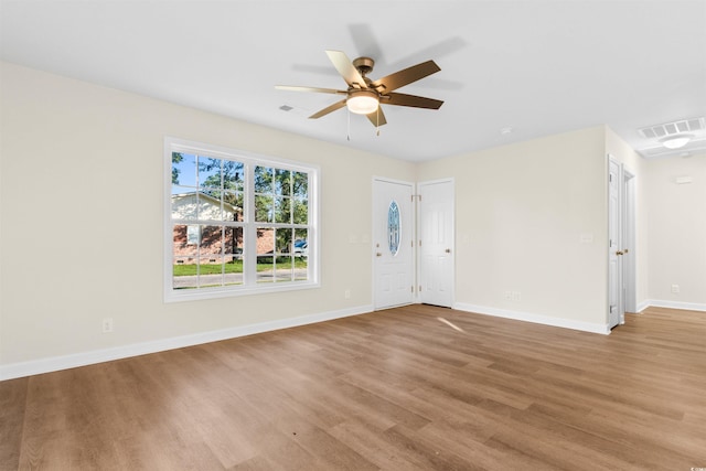 unfurnished living room with light hardwood / wood-style floors and ceiling fan