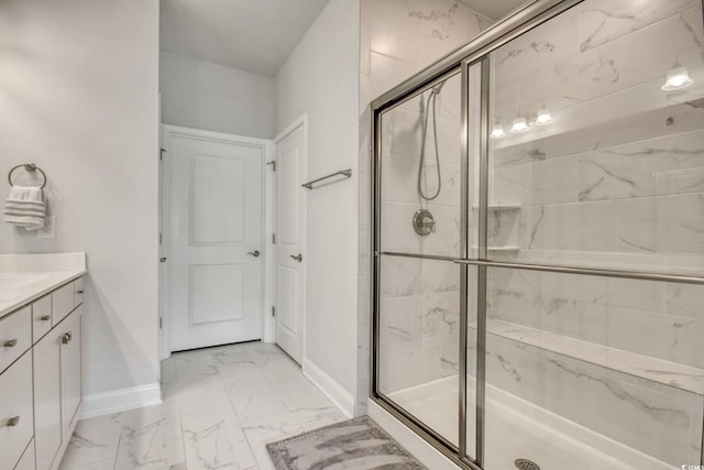 bathroom with vanity and walk in shower