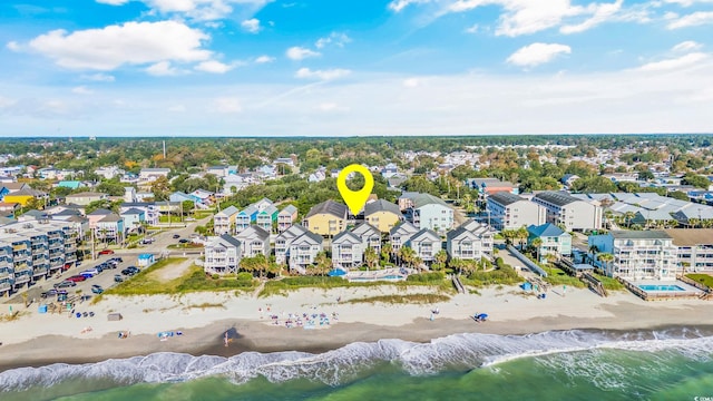 bird's eye view with a beach view and a water view